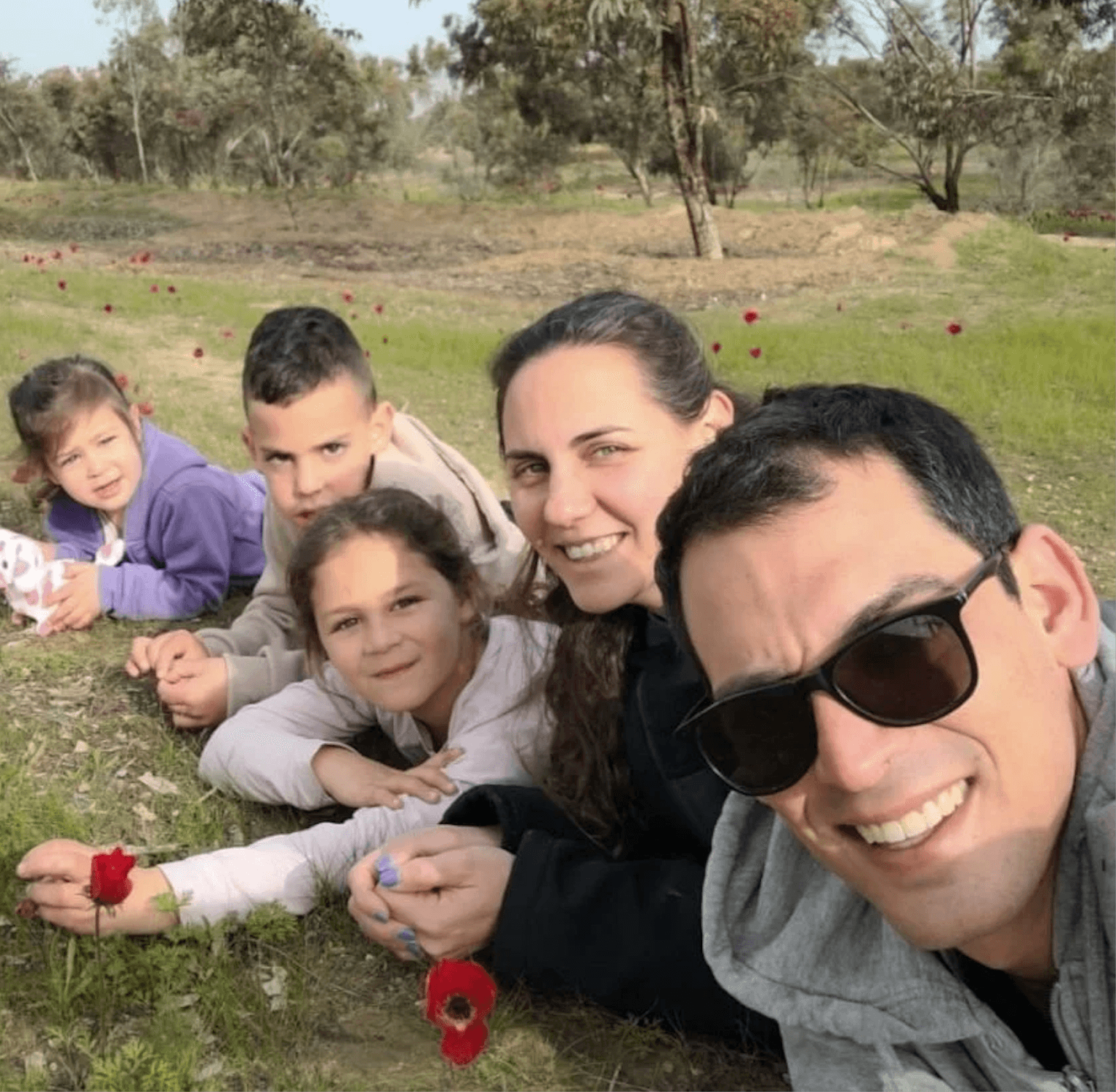 A family from the Eshkol region together outdoors